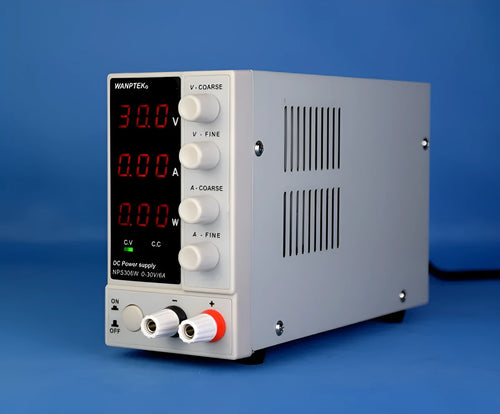 White adjustable DC power supply unit with voltage and current controls for electronics testing