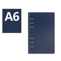 Imitation leather loose-leaf business notebook in blue, shown in A5 size on a wooden desk.