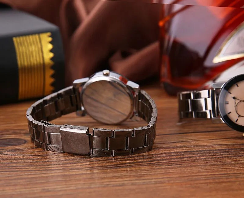 Quartz movement black steel strap watch with metal case and glass mirror