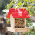 Suspended pine wood bird feeder with red roof and log texture finish