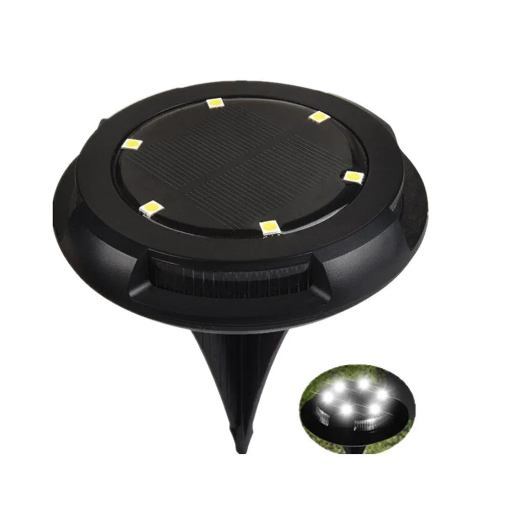 Black LED solar underground lawn light with seven colour cold white light, 11x4x13cm