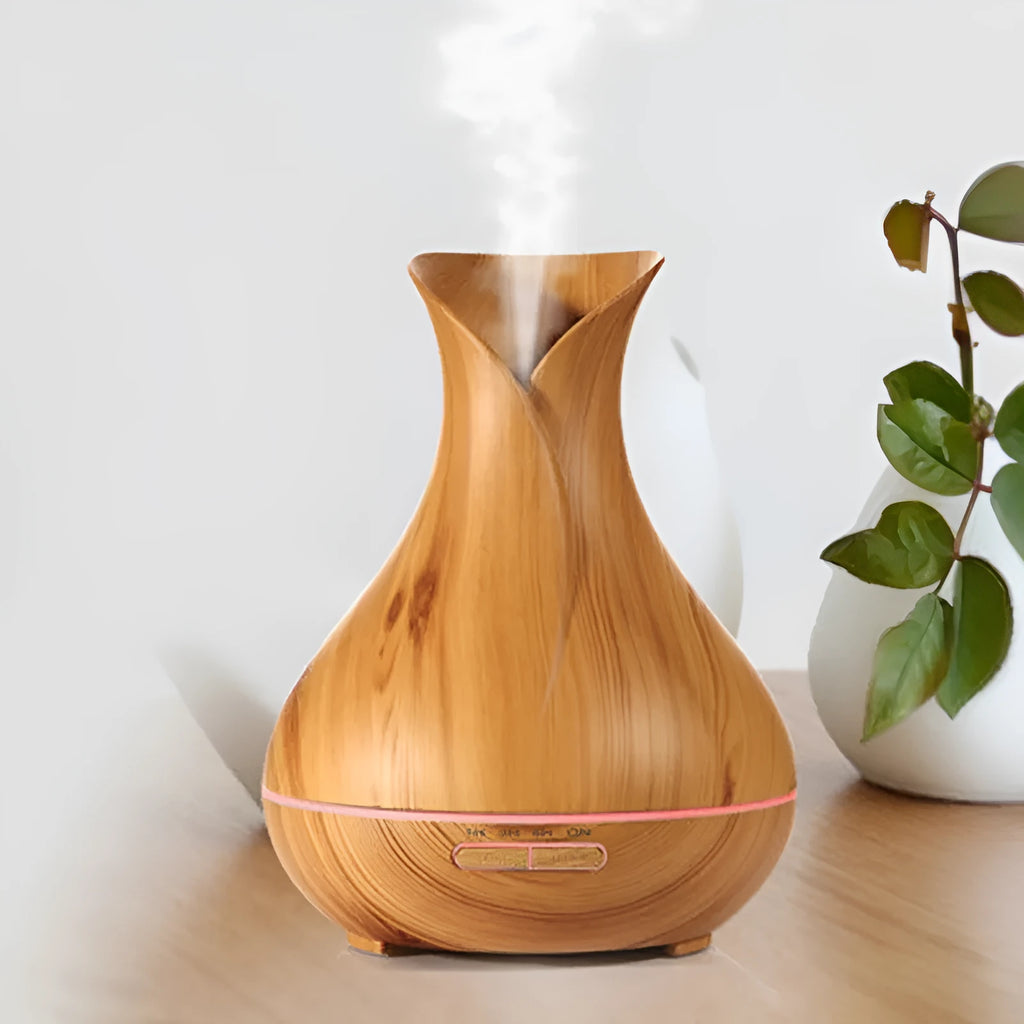 Ultrasonic aroma diffuser 400ml tank with 7 LED colour lights, dark wood finish, and plug options.