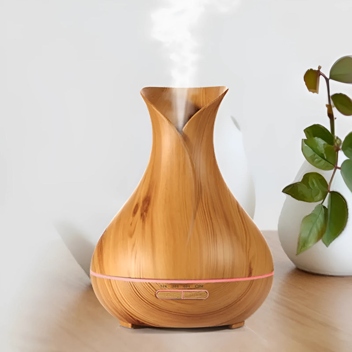Ultrasonic aroma diffuser 400ml tank with 7 LED colour lights, dark wood finish, and plug options.