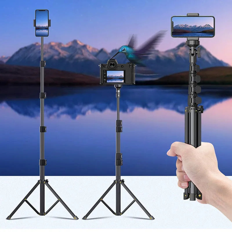 Black aluminium selfie stick tripod extended to full height with smartphone mounted