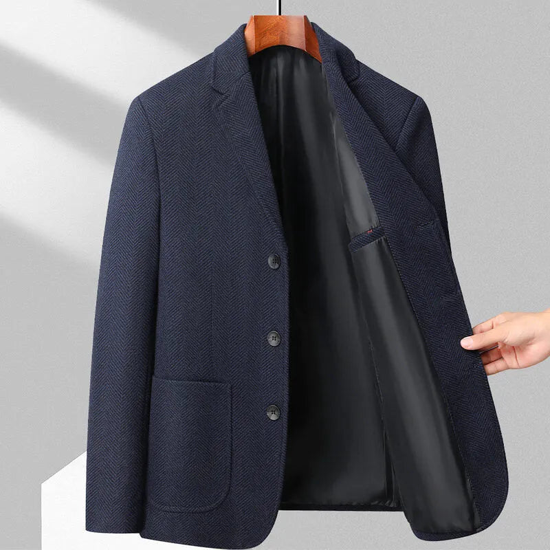 Man wearing a loose-fit solid colour wool coat in khaki.