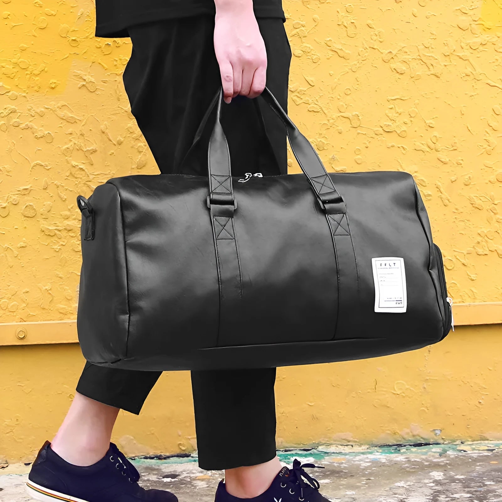 Black waterproof sports bag with separate shoe compartments and diagonal straps in two size options