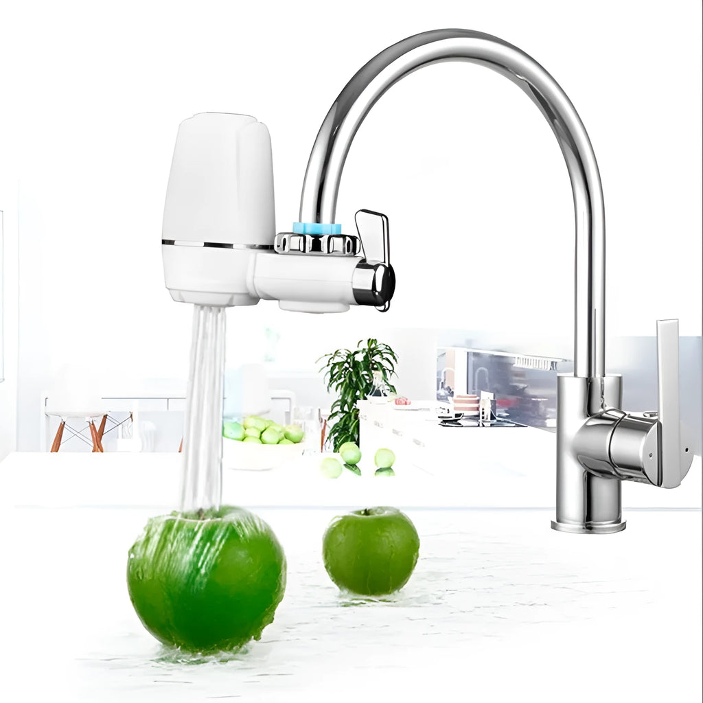 White plastic faucet water filter unit with ceramic core and universal thread adapters for kitchen tap installation.