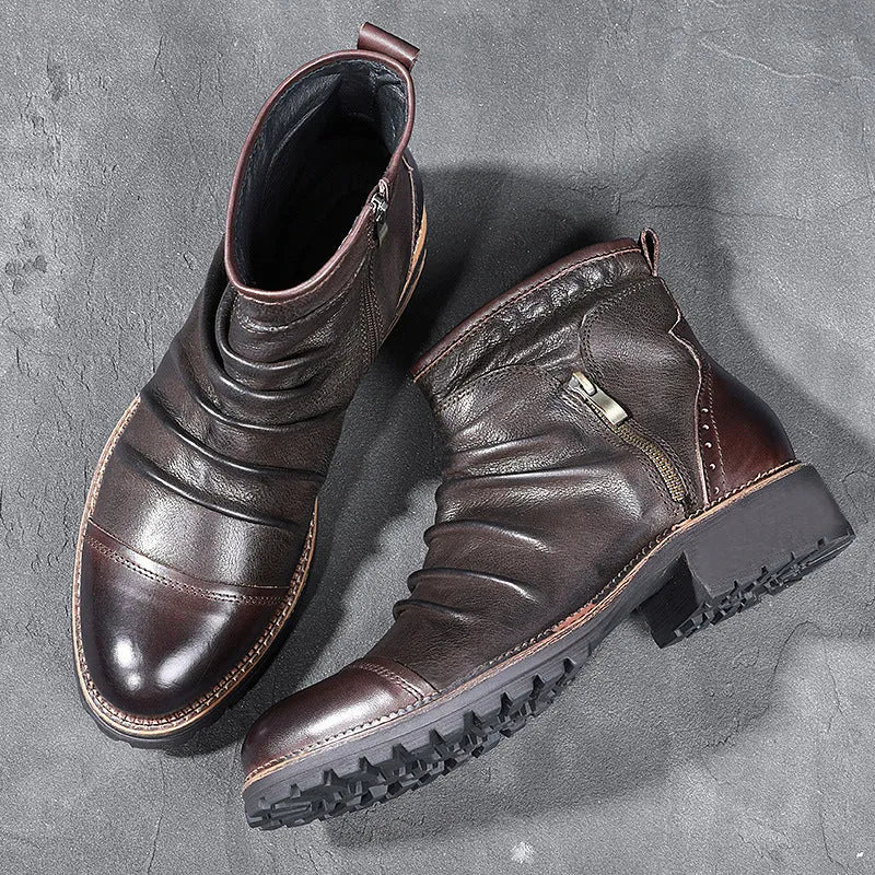 Black side-zip cowboy boot with round toe and a mid-height horseshoe heel on a plain background.