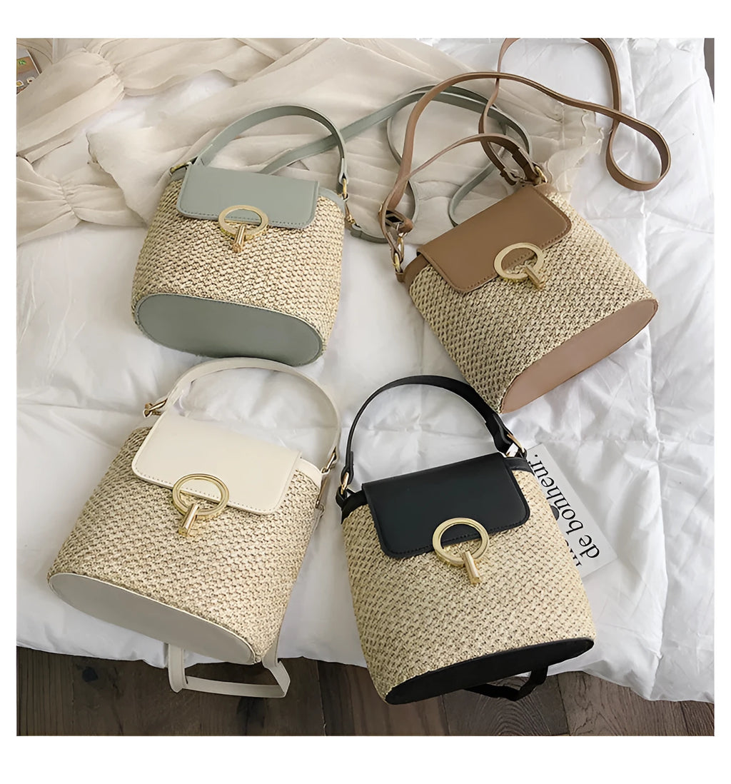 Women's straw woven bucket shoulder bag in black with cover flap, small size, polyester lining