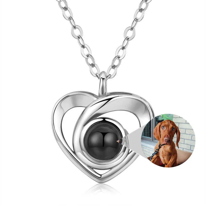 S925 silver heart shaped photo projection pendant necklace with silver finish on white background