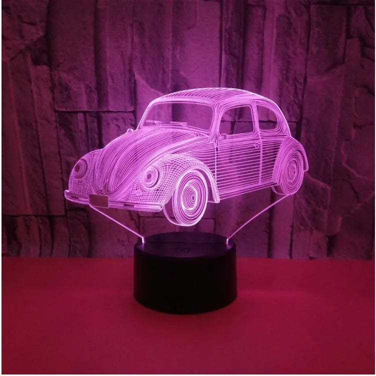 Small 3D visual table lamp with colourful LED patterns and acrylic shade