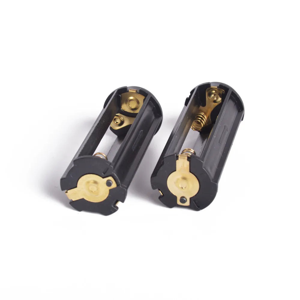 Black ABS battery rack holding three AAA batteries, 64mm length
