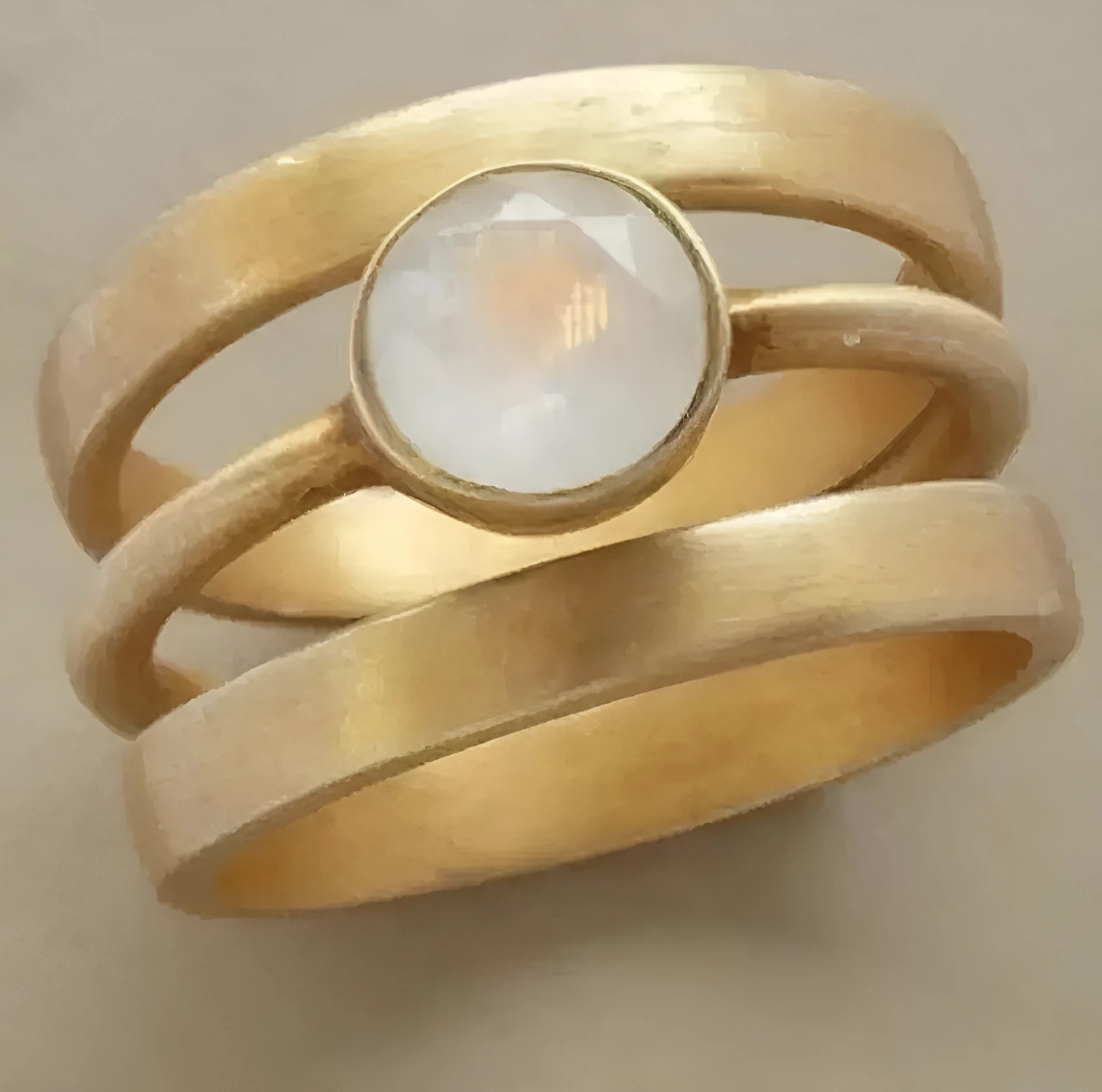 Gold-plated titanium steel ring with geometric hollow design and white chalcedony stone detail