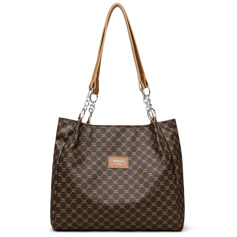 Women's retro style handbag in soft brown PU leather with a polyester lined interior.