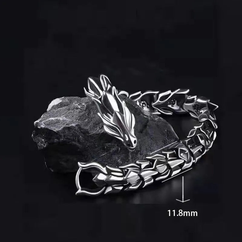 Men's silver geometric keel shape alloy bracelet on a neutral background showing minimal design
