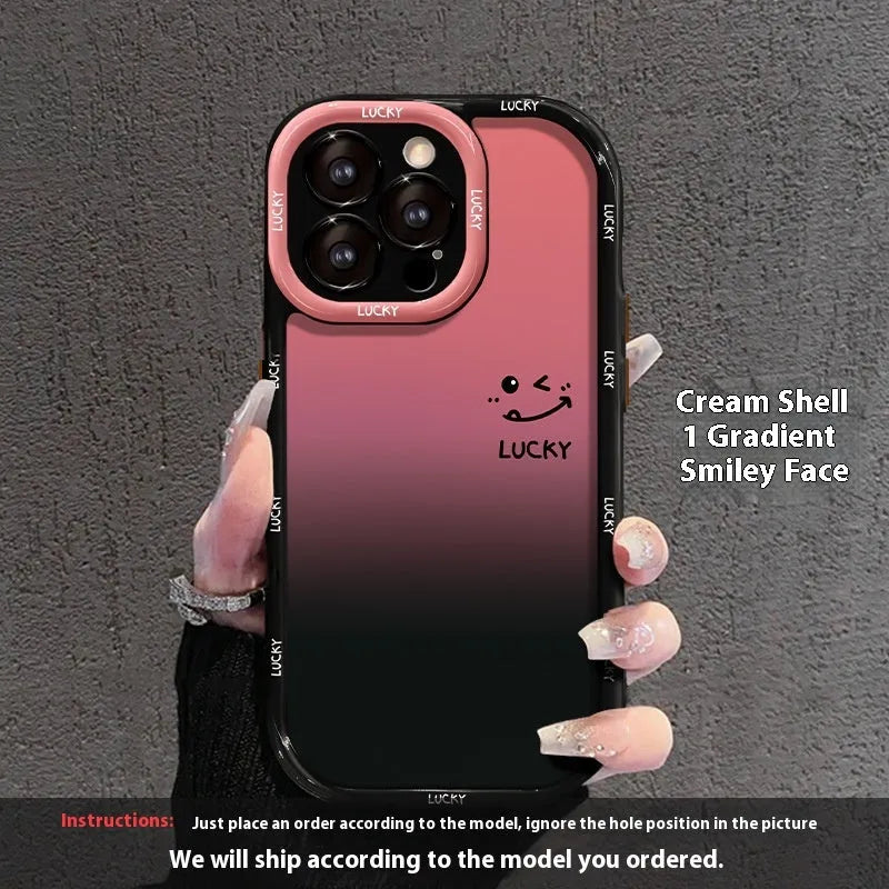 Cream coloured acrylic phone case with black gradient love heart design, showing fine-hole cut-outs for ports.