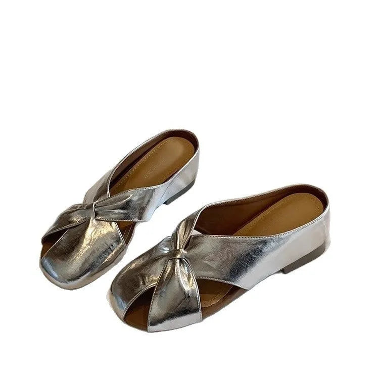 Women's hollow-out half slippers in beige with patent PU leather upper and rubber sole