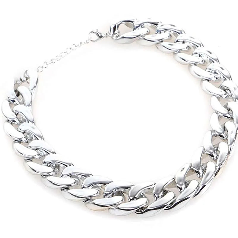 Geometric dog collar chain necklace with buckle on white background showing KC Gold, Local Gold, Rose Gold, and White colour options