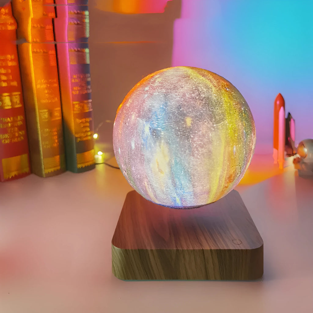 Magnetic levitation galaxy decorative light with a floating walnut-coloured moon lamp above a circular base.