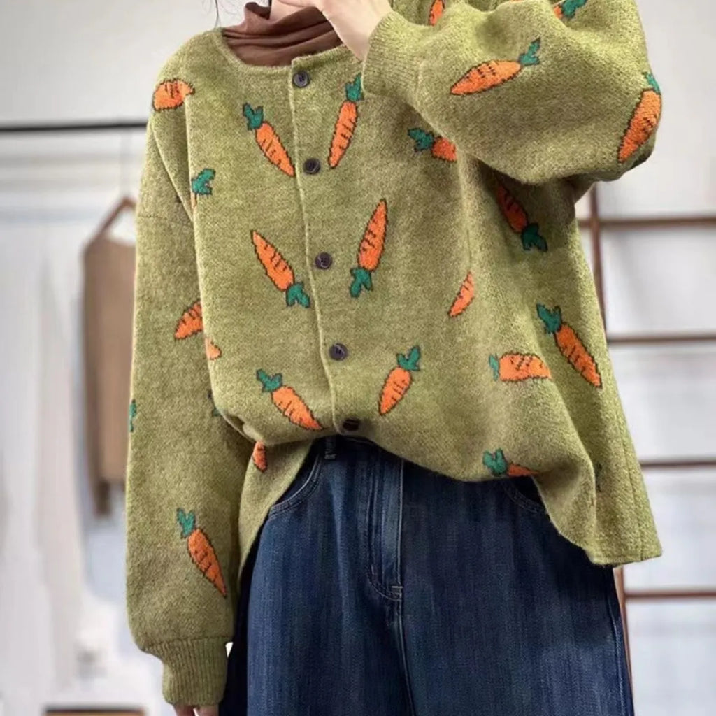 Round neck loose cardigan sweater with artistic colour contrast printing, made from viscose fibre.