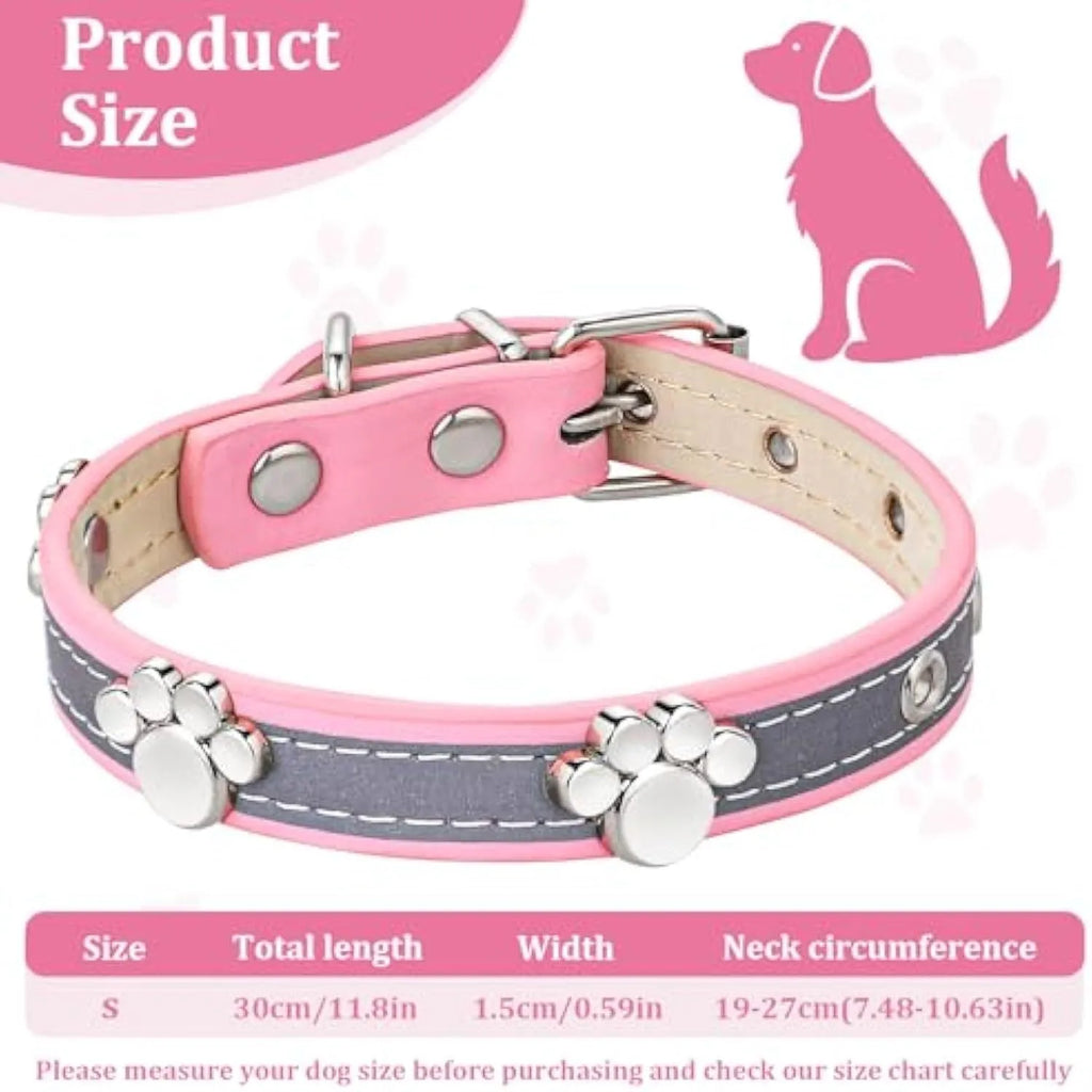 Reflective adjustable leather dog collar with cute paw rivet on a grey background.