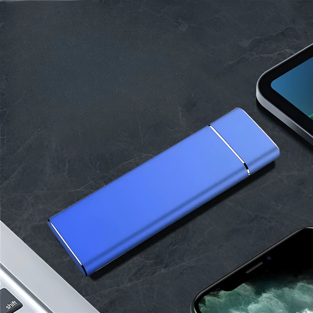 Sapphire blue portable solid state hard drive with metal housing, USB cable and manual