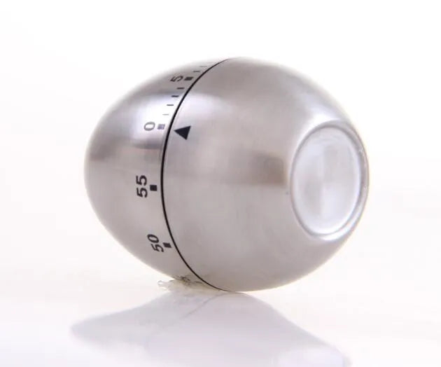 Stainless steel mechanical kitchen timer with egg shape measuring 7cm high