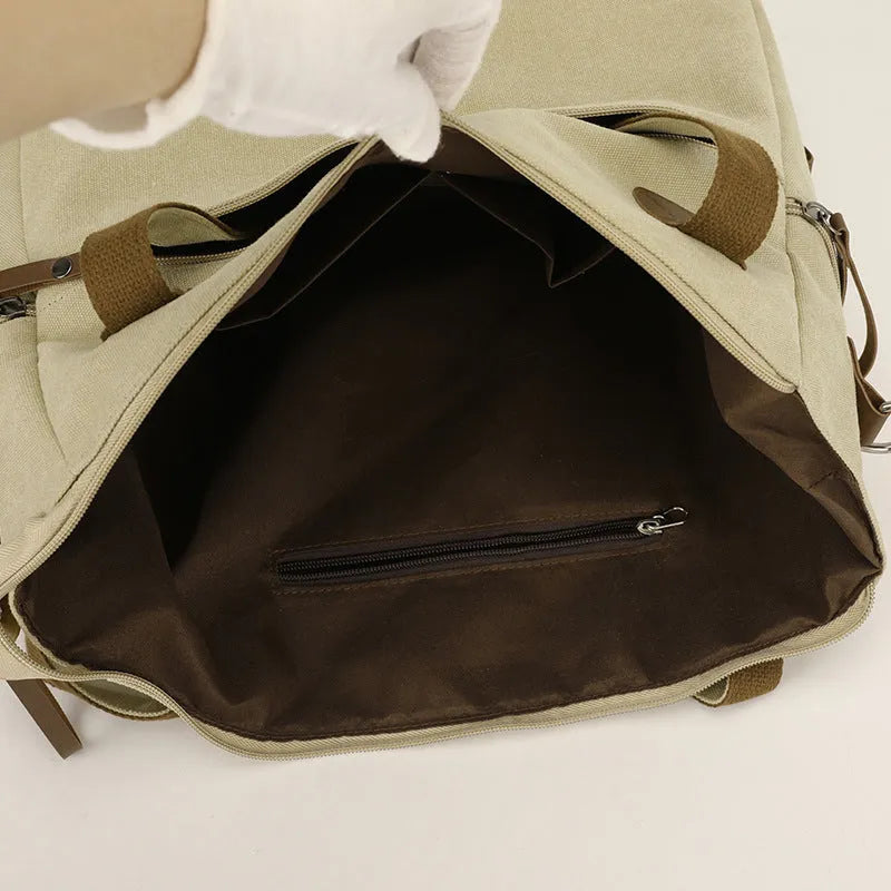 Grey retro-style canvas women's handbag with large capacity and internal pockets.