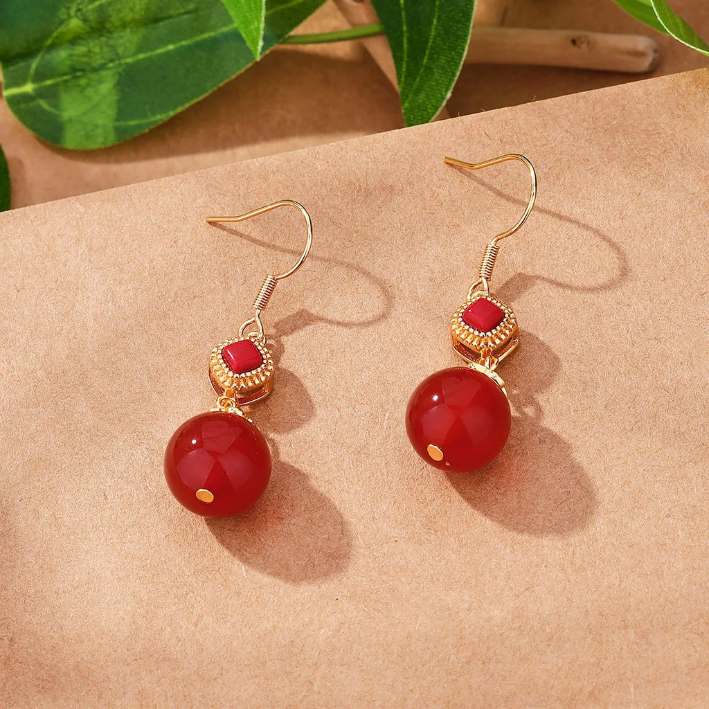Geometric agate earrings with Southern Red Agate beads and silver inlaid jasper detail on copper alloy