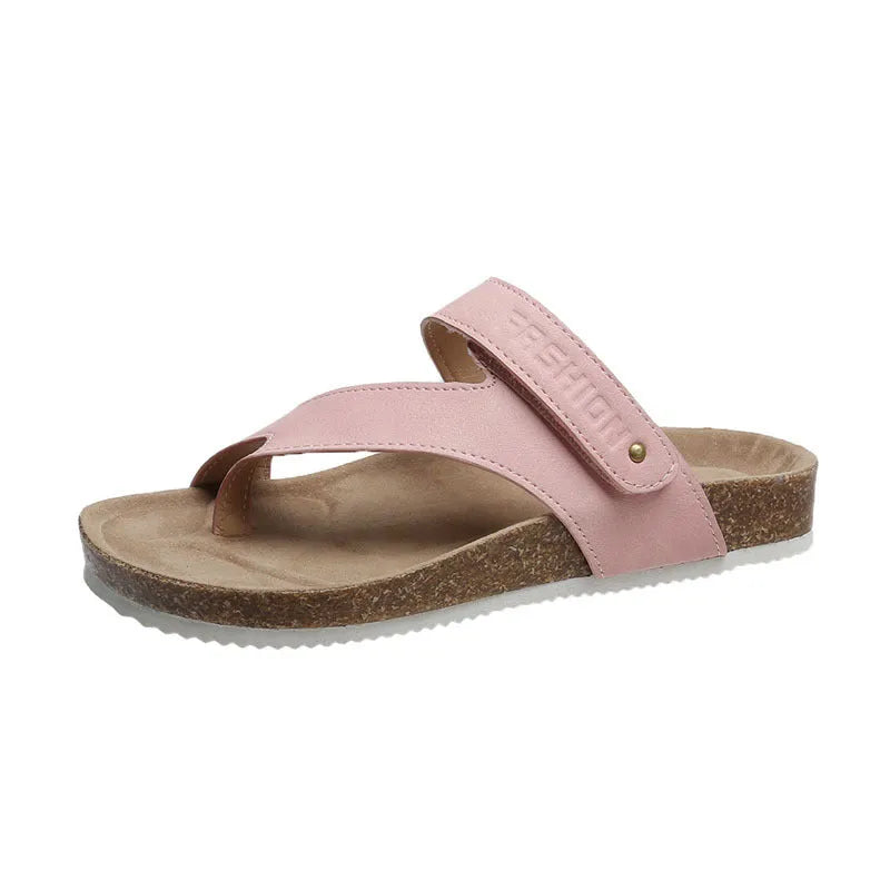 Women's flat toe ring flip-flops in blue with a thick foam sole, shown from the side.