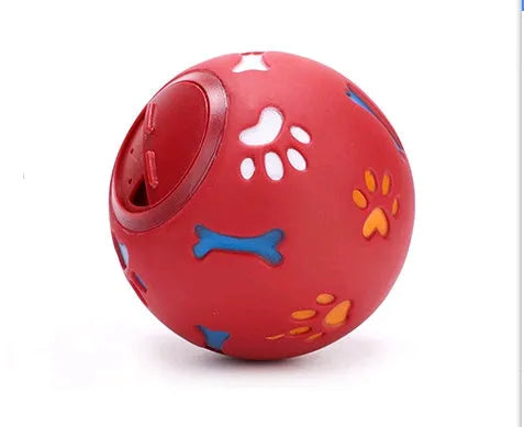 Rubber puzzle ball for dogs with uneven surface, footprints pattern, blue and red colours, sizes 7.5cm and 11cm