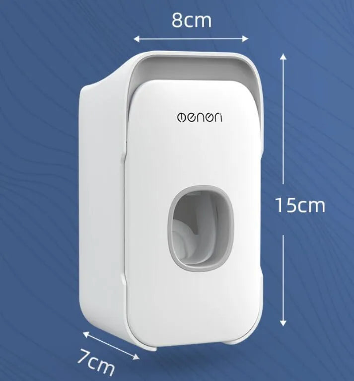 Automatic toothpaste dispenser wall mounted unit in blue, grey or pink colours with no-drip nozzle