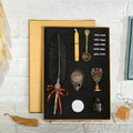 European style retro sprinkled gold feather pen with ink bottle and spoon on display