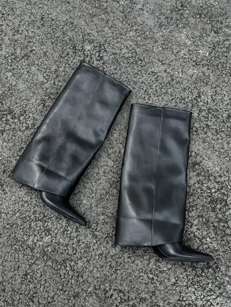 Women's black pointed mid heel riding boots with microfiber upper and rubber sole
