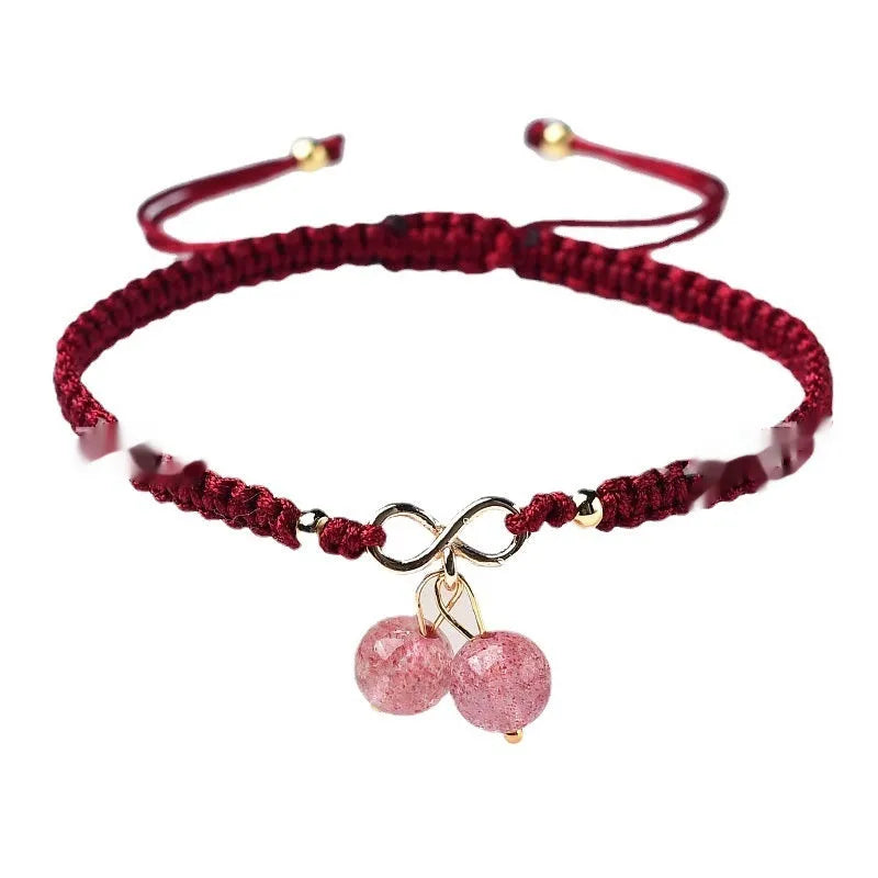 Women's natural strawberry quartz bracelet with fruit-shaped pendant and adjustable cord closure