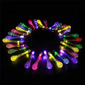 Solar-powered LED Water Drops string lights installed outdoors with 30 bulbs on a 6.5 metre waterproof cable