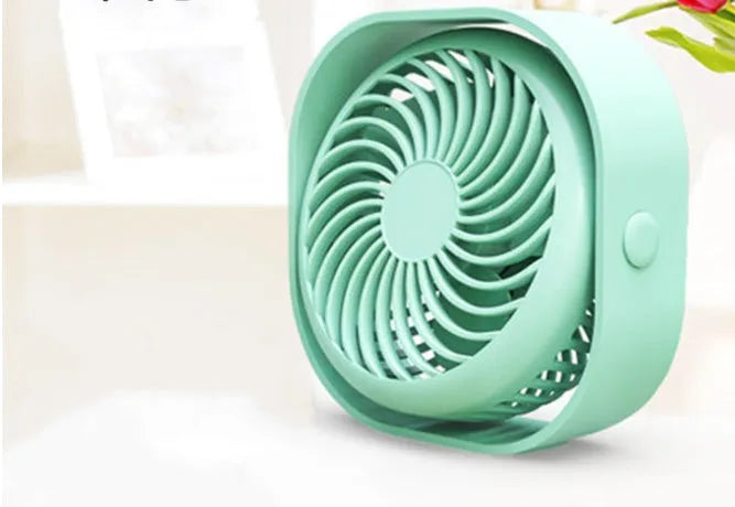 USB desk fan with alarm clock display, shown in blue with rotating head