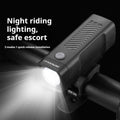 USB rechargeable bicycle headlight with quick-release strap on a handlebar.