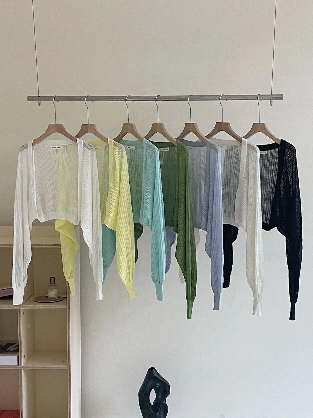 Women's white linen-look blouse with lantern sleeves and hollow-out detail, long sleeve