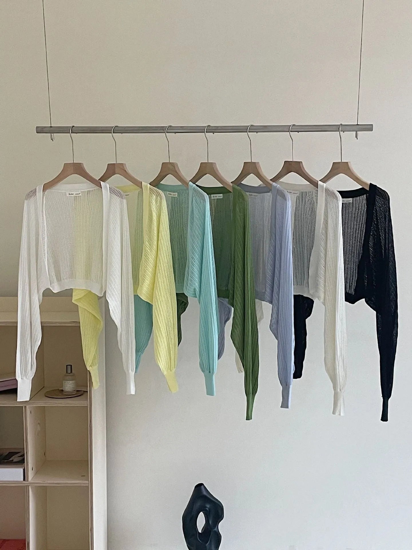 Women's white linen-look blouse with lantern sleeves and hollow-out detail, long sleeve