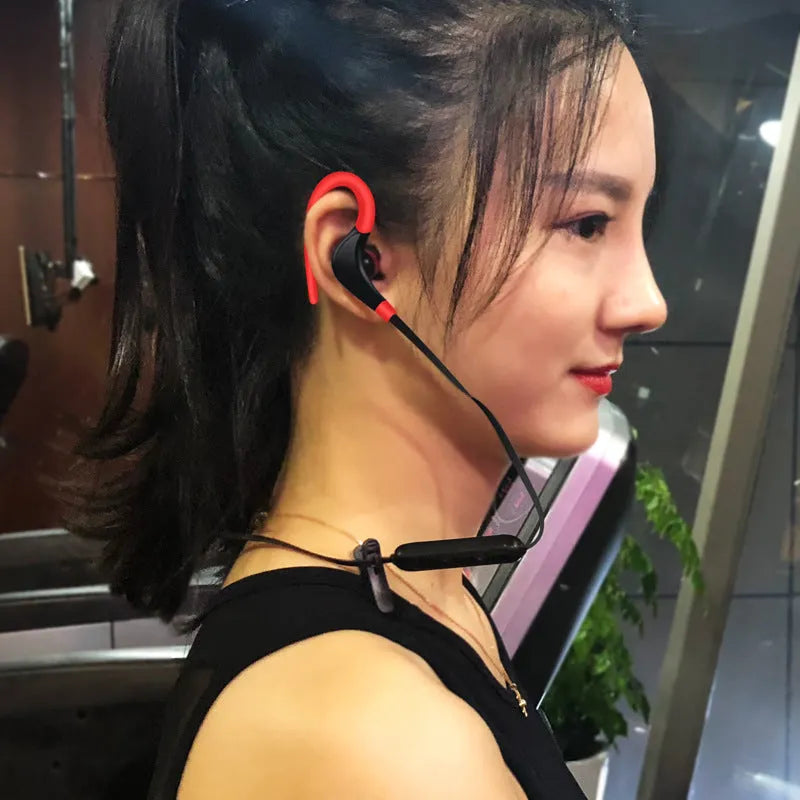 Wireless Bluetooth earphone in black with charging cable, 10 metre range, 4.5 hour talk time
