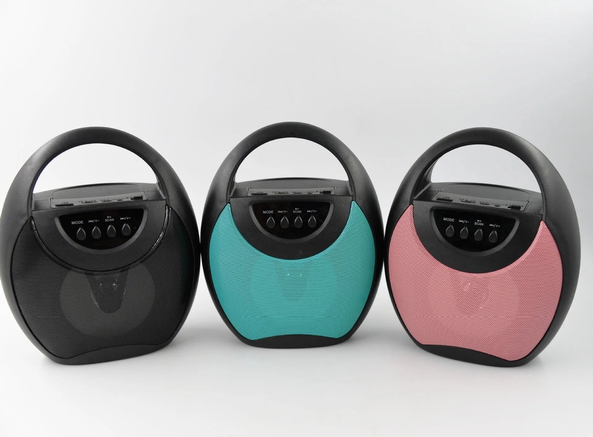 Portable Bluetooth speaker in black, blue, or pink with USB port and SD card slot