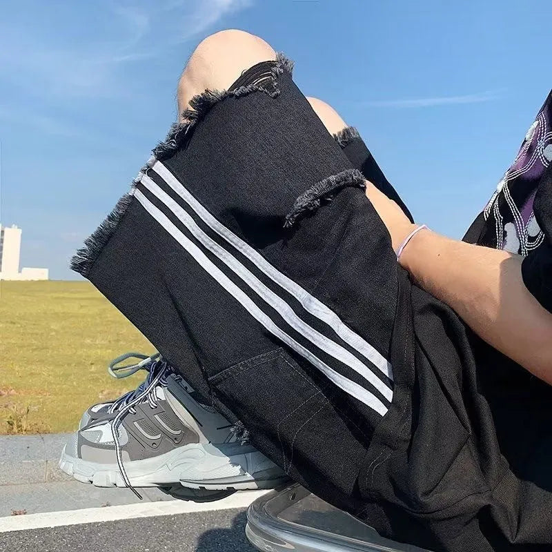 Men's black ripped denim shorts, loose fit, retro three-bar design, fifth length, cotton, sizes S to 3XL.