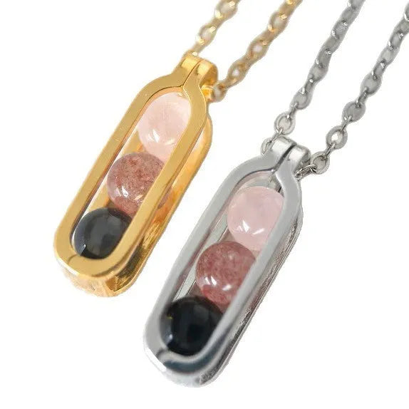 Minority simple pearl necklace in titanium steel with inlaid pearl, shown in gold or silver steel colour.