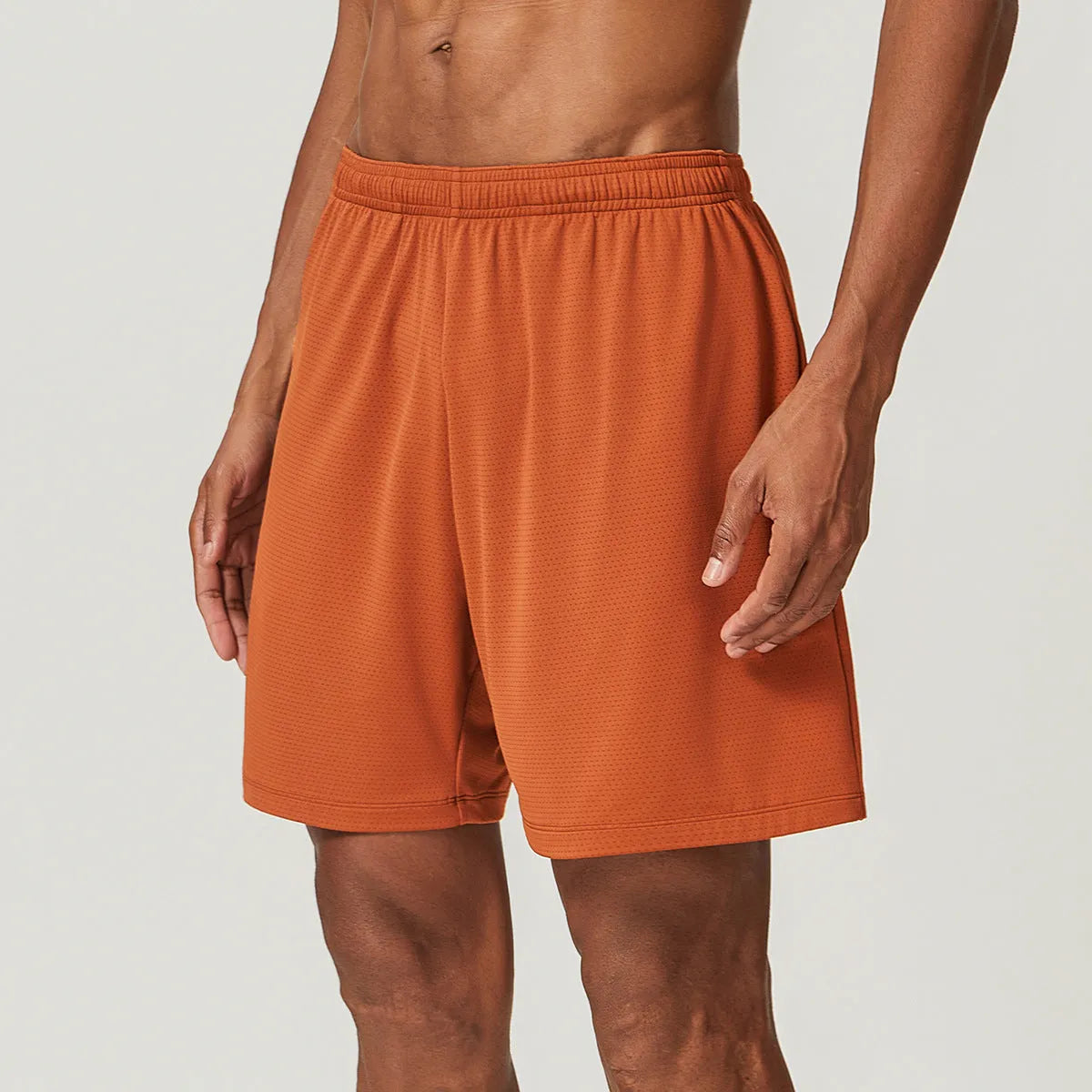Men's quick-drying double-layer running shorts in sky green, showing mid-waist short length design.