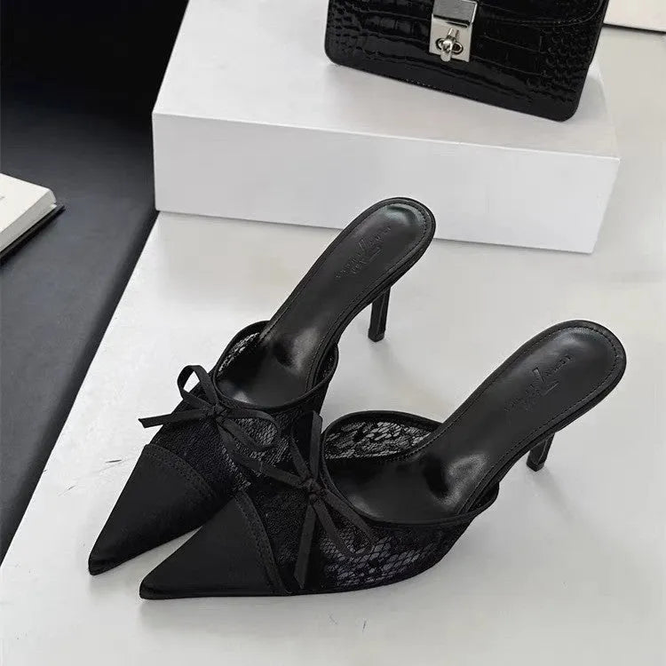 Women's light brown lace bowknot pointed toe high heels with mesh upper on a neutral background