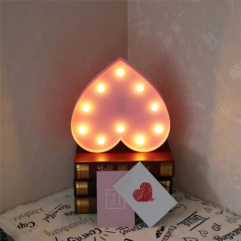 Romantic 3D love heart marquee letter nights lamp in pink plastic with warm white LEDs, wall mounted