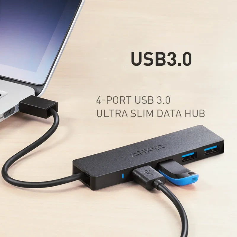 Black Anker 4-port USB 3.0 hub with attached cable on a desk
