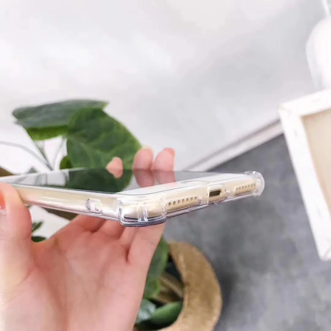 Mirror finish iPhone case with reflective surface showing TPU flexible construction and precise port cutouts