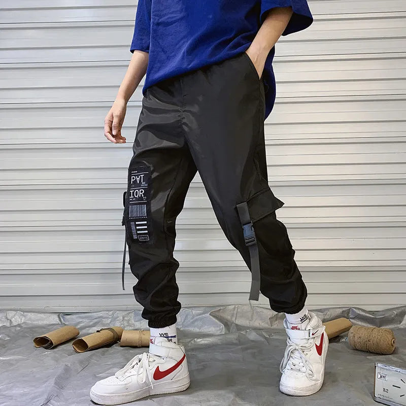 Mens hiphop tapered trousers in black acetate fibre with small-foot opening side view